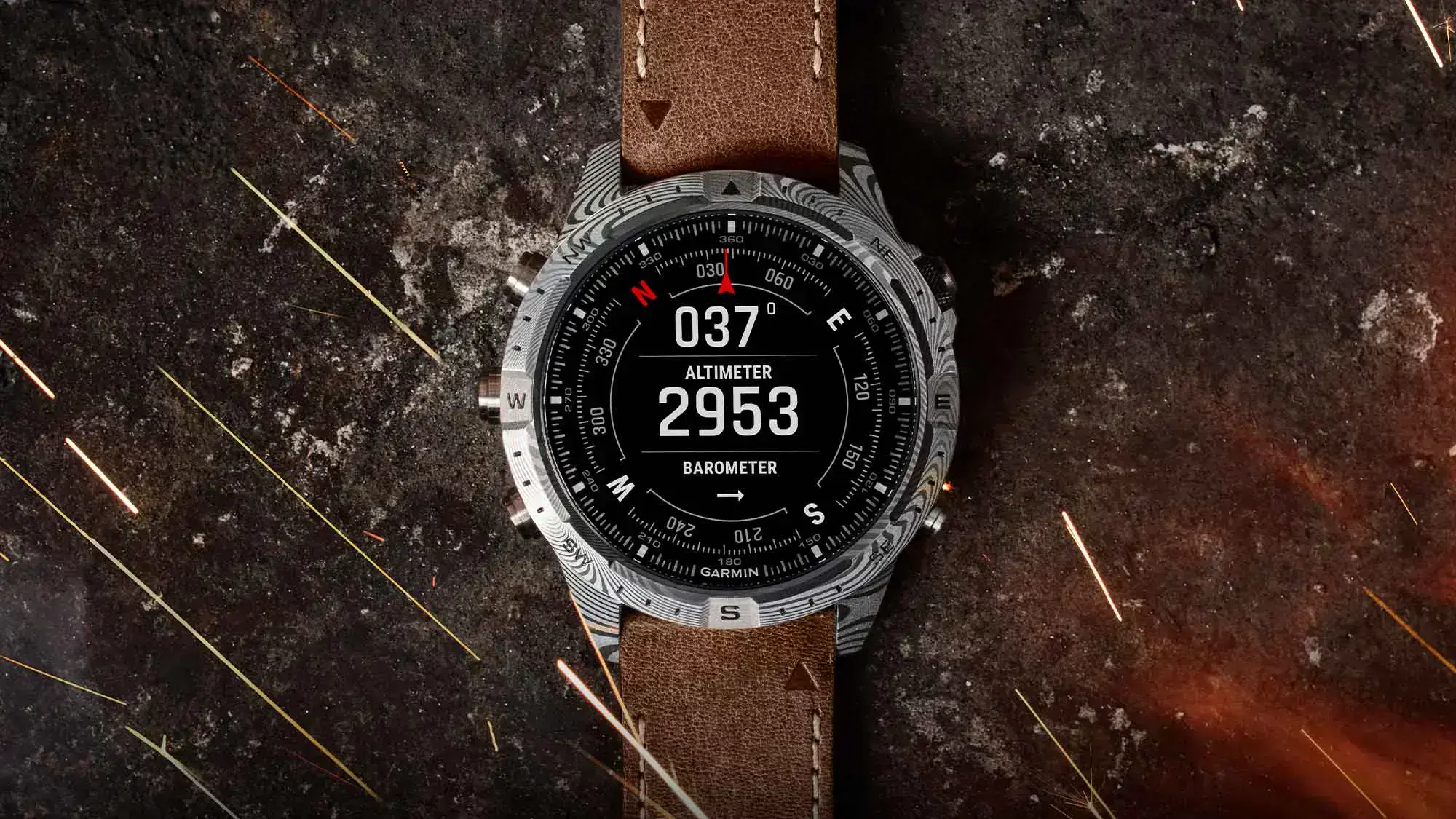 Годинник Garmin MARQ Adventurer Gen 2 з дамаської сталі на фоні природи