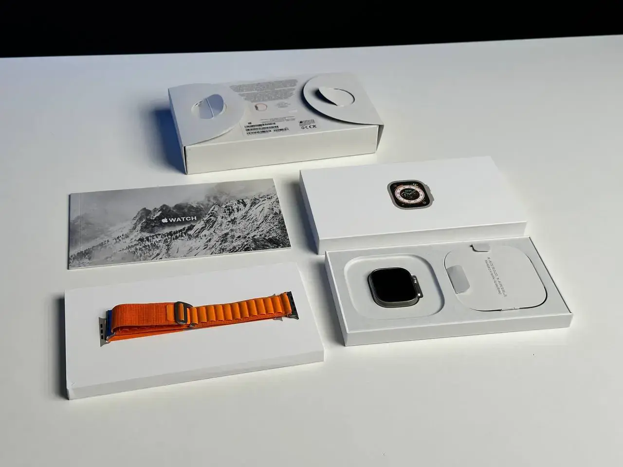 USED Apple Watch Ultra GPS + Cellular 49mm Titanium Case with Orange Alpine Loop - Medium (MQEU3, MQFL3)