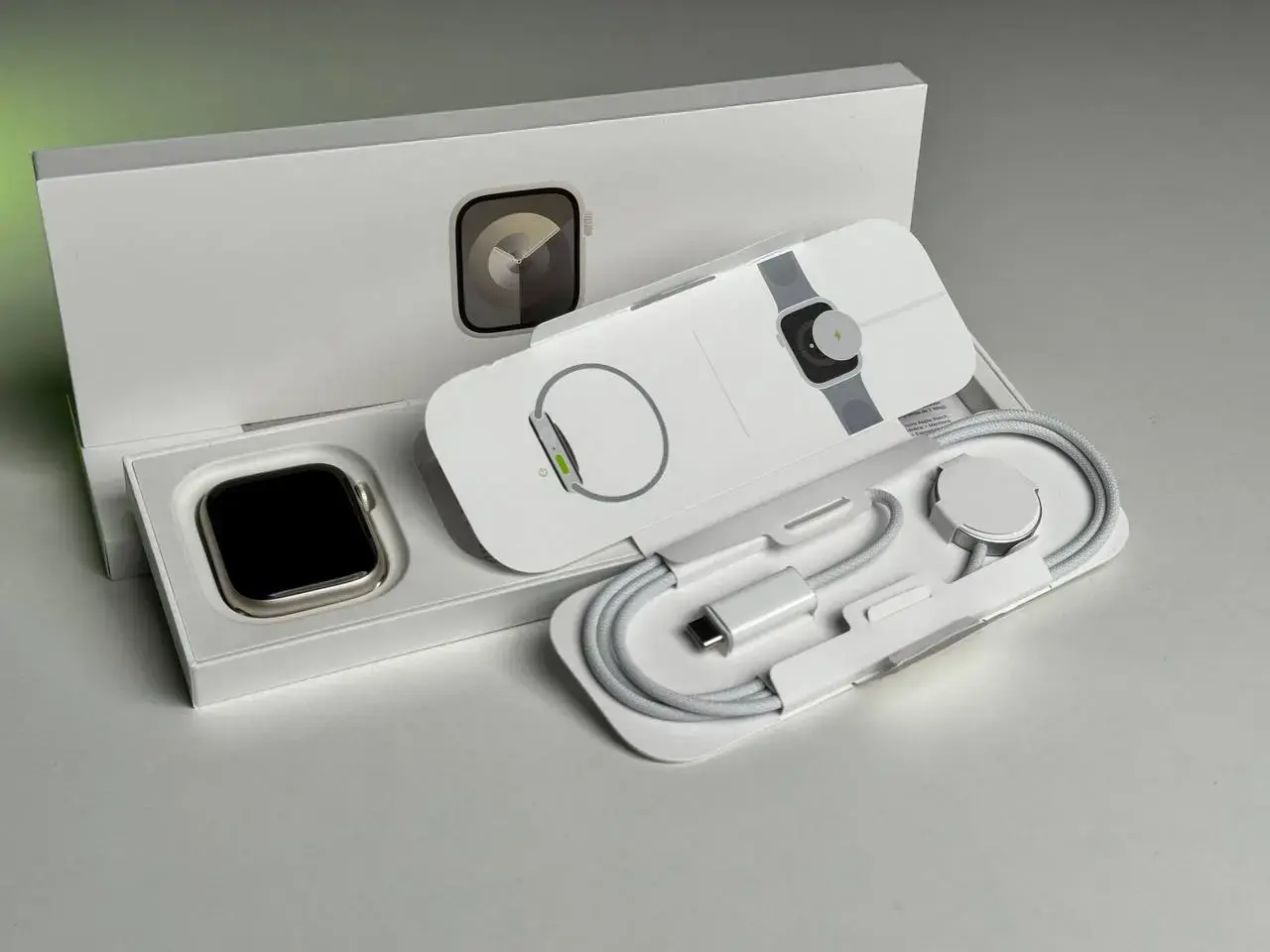 NEW OPEN BOX Apple Watch Series 9 GPS + Cellular 45mm Starlight Aluminum Case with Starlight Sport Band - M/L (MRM93)
