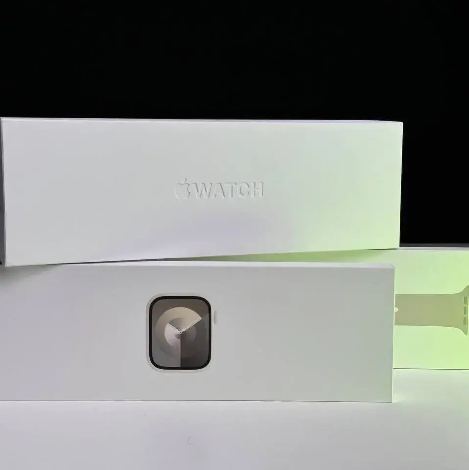 NEW OPEN BOX Apple Watch Series 9 GPS + Cellular 45mm Starlight Aluminum Case with Starlight Sport Band - M/L (MRM93)