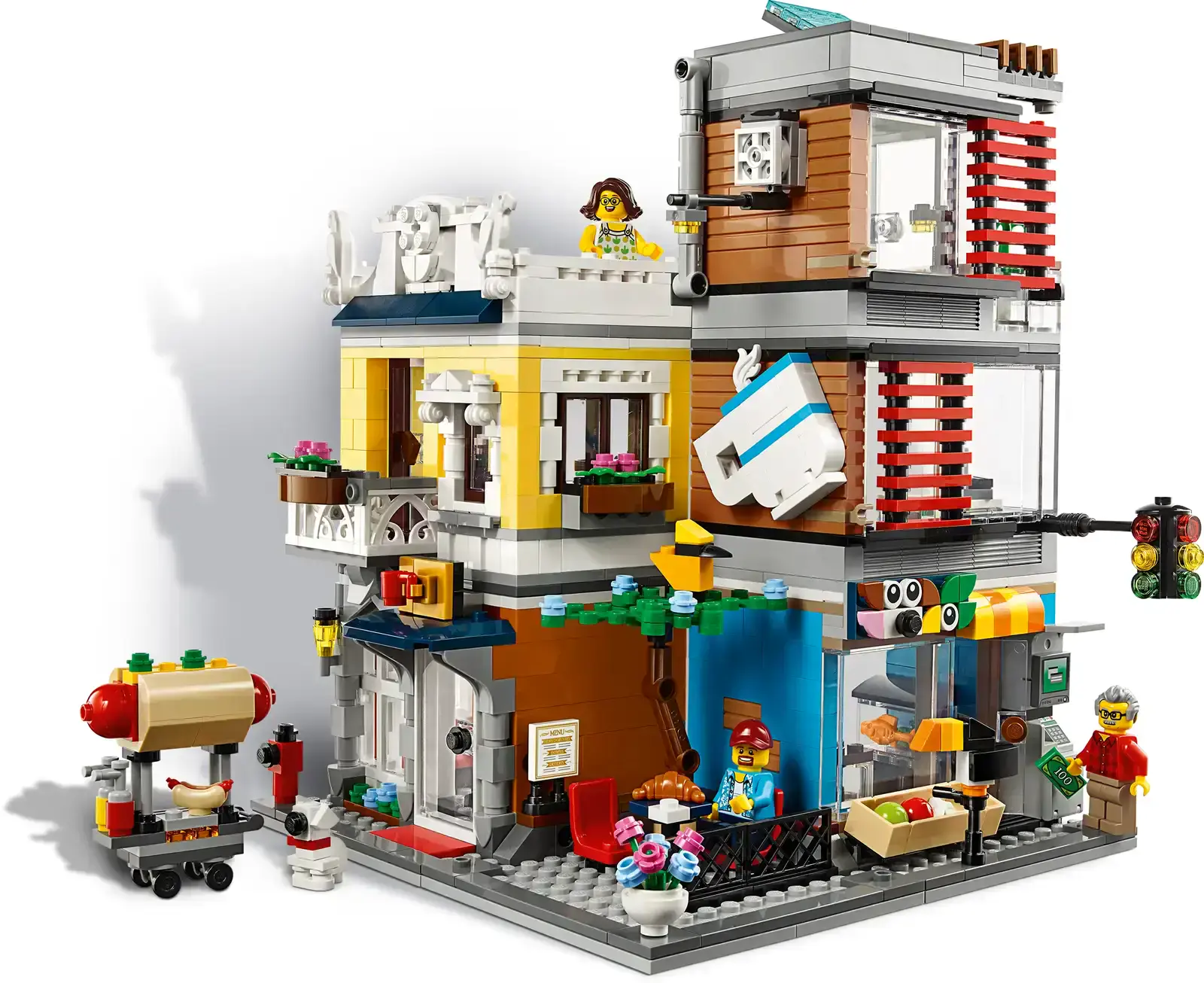 Блоковий конструктор LEGO Creator Зоомагазин та кафе в центрі міста (31097)